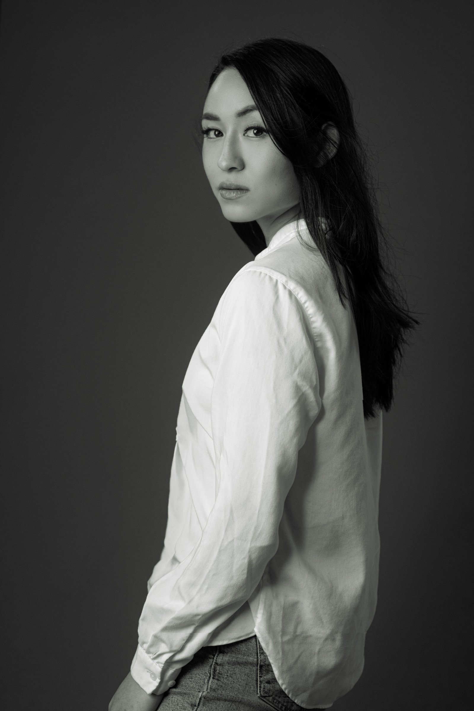 Black-and-white studio portrait of Akane Millan